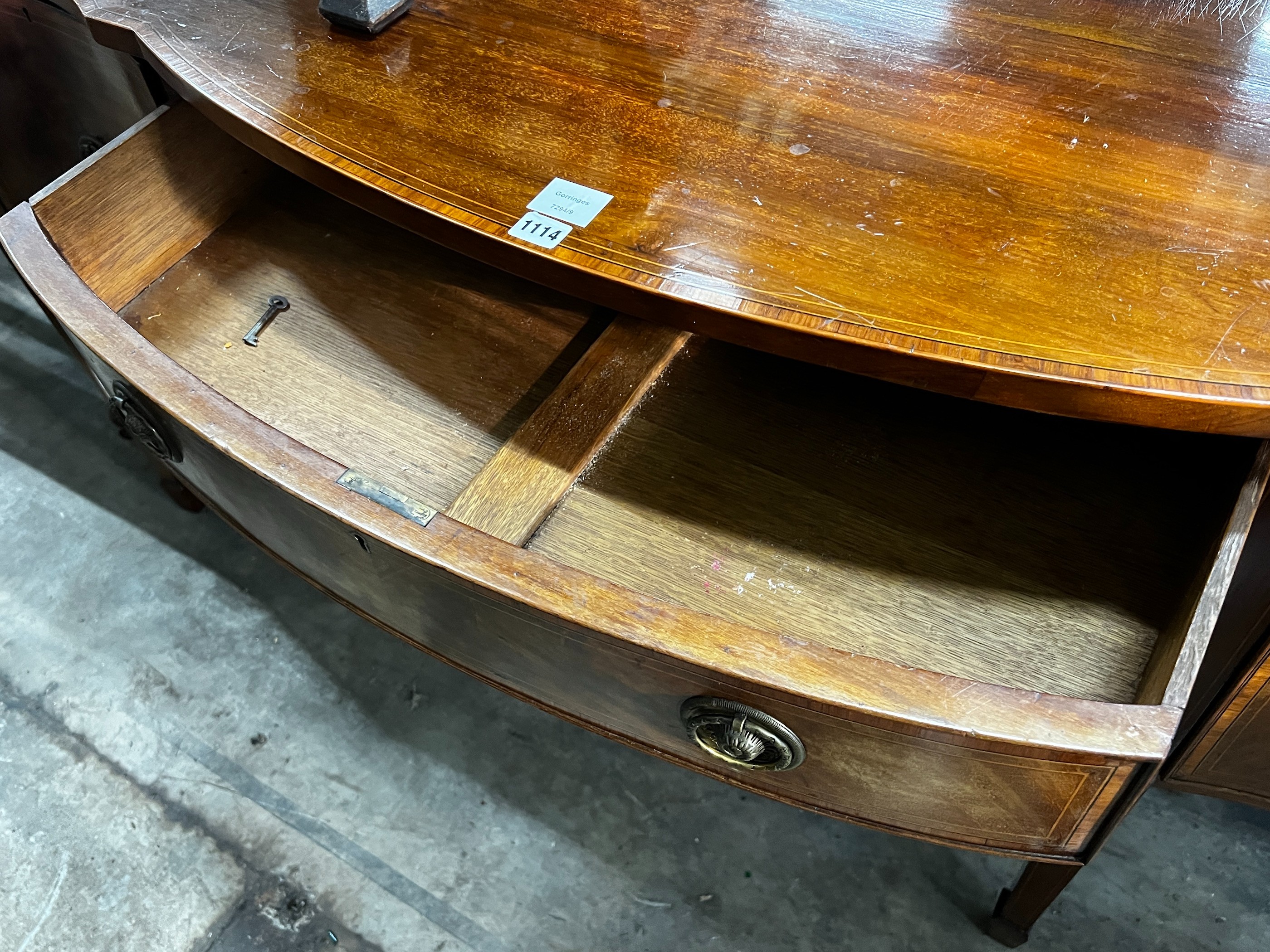 A George III style banded mahogany serpentine fronted sideboard, length 183cm, depth 64cm, height 92cm